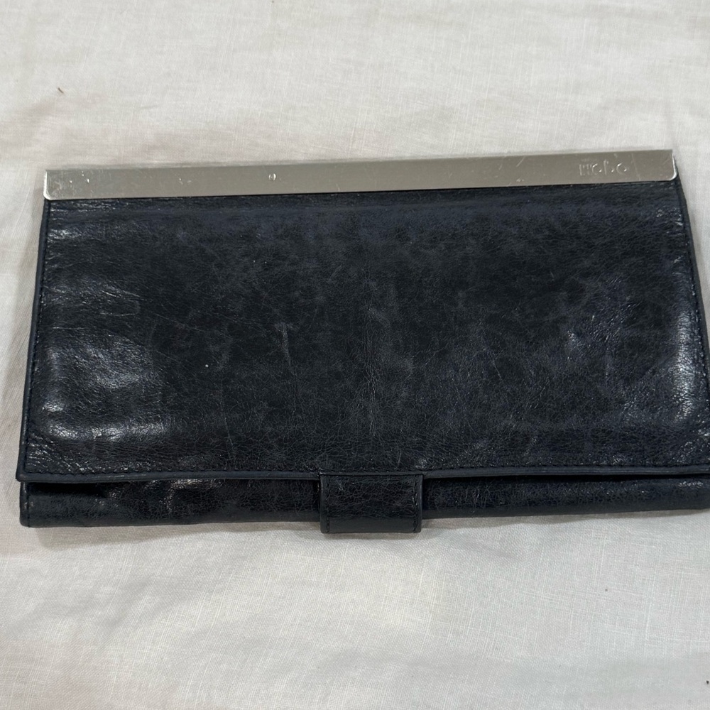 HOBO Maxine Leather
Framed Clutch Wallet in black with silver hardware